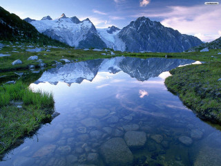 Mountain lake rocks grass clouds - rock and grass free wallpaper