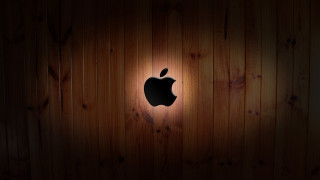 Wooden wall apple logo light 2 - a wooden wall free wallpaper