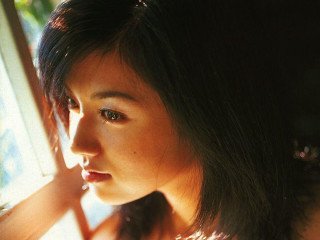 Woman window sunshine blackhair greeneyes - her face and shoulder free wallpaper