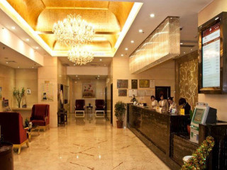 Lobby chandelier bar people sitting - people sitting free wallpaper