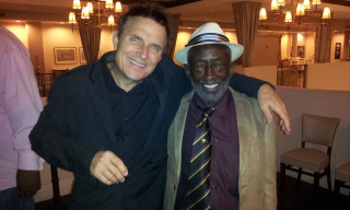 Two men standing room chairs - stanley artgermm free wallpaper