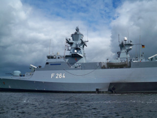 Battleship floating water cloudy sky 5 - cloud above free wallpaper