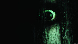 Green eye long hair dark - a green glow free wallpaper