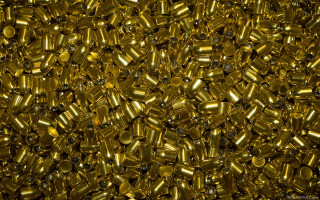 Gold colored pills scattered ground - cornelia parker free wallpaper