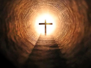 Cross tunnel light person walking - radiant light free wallpaper for desktop