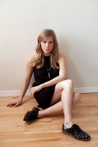 Woman black dress shoes sitting - the floor free wallpaper for mobile