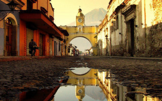 Street clock tower puddle water 2 - quito school free wallpaper for desktop