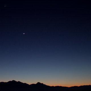 Mountain range night moon distant - a view of a mountain range free wallpaper for tablet