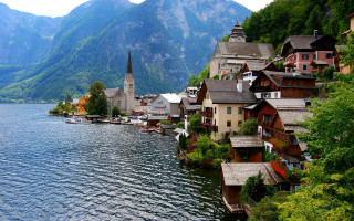 Village lake mountains church shore - a village free wallpaper for desktop