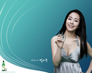 Woman holding glass water bottle - dark background free wallpaper for desktop