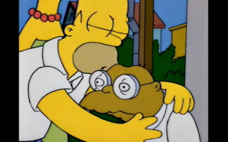 Man holding cartoon character head - emotional free wallpaper