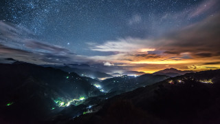Night sky stars clouds mountain 2 - over a mountain range free wallpaper for desktop