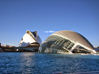 Curved roof building boat waterfront - a large building free wallpaper