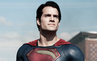 Superman suit man heroic pose - a man in a superman suit free wallpaper