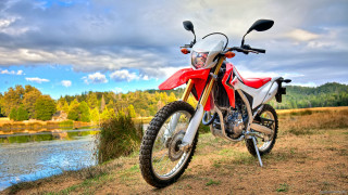 Red motorcycle dirt field river - allen tupper true free wallpaper