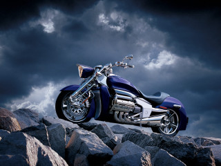 Motorcycle parked rocky hill cloudy - rock and boulders free wallpaper