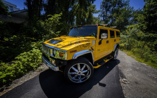 Yellow hummer truck nature road - the sun free wallpaper