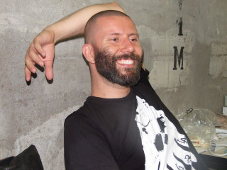 Smiling man haircut bearded barber - ignacio fernandez rio free wallpaper