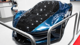 Futuristic car showroom exhibition display - f 8 aperture free wallpaper