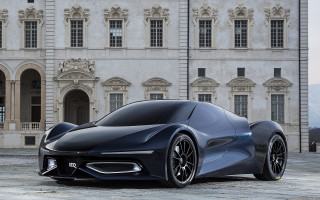 Futuristic car parked large building 3 - a futuristic car free wallpaper