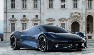 Futuristic car clock tower building - a futuristic car free wallpaper