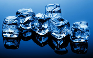 Ice cubes blue surface water - a blue surface free wallpaper for desktop