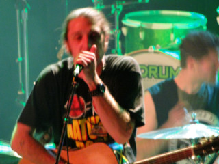 Man holding guitar microphone drum - david boyd free wallpaper