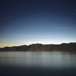 Lake mountain star trail sky - free airplane wallpaper for tablet