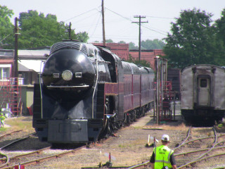 Train parked tracks yellow vest - free cars wallpaper for desktop