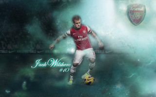 Man redshirt kicking soccerball greenfield - a soccer ball free wallpaper