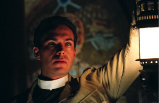 Man holding lamp dark room - the wall behind free wallpaper