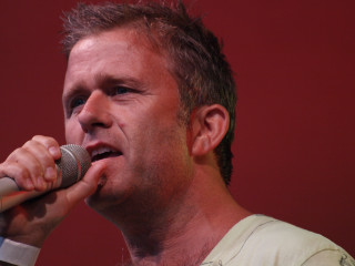 Man microphone red background red - breyten breytenbach free wallpaper