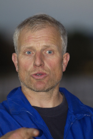 Man blue jacket making face - a blue jacket free wallpaper for mobile