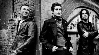 Men group brick wall doorway - brian fies free wallpaper