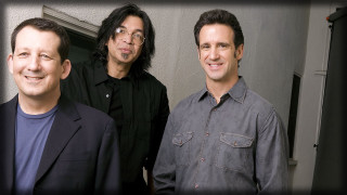 Three men standing building door - glass free wallpaper