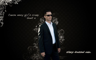 Man suit sunglasses floral quote - a man in a suit and sunglasses free wallpaper