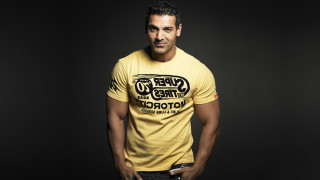Man yellow shirt pose hands - altoon sultan free wallpaper
