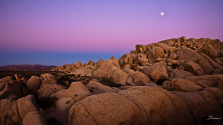 Full moon rocky desert purple - a purple sky in the background free wallpaper for desktop