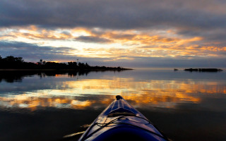 Kayak sunset water clouds view - over the water free wallpaper