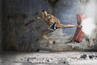 Man kicking punchingbag dirtyroom starrysky - hyper real free wallpaper