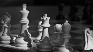 Chess board pieces person standing - the board free wallpaper
