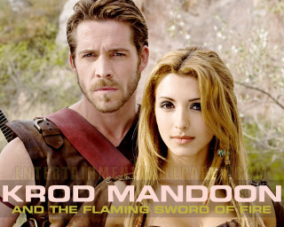 Man woman sword pose rock - a picture together free wallpaper