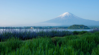 Mountain lake grass field scenery - a lake in the foreground free wallpaper