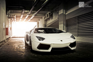 White sports car parking garage 13 - a parking garage free wallpaper for desktop