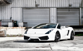 White sports car building open - a white sports car free wallpaper for desktop
