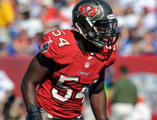 Football player black helmet red - a black helmet free wallpaper