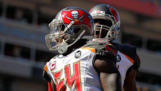 Football players helmets field clock - a surrealist painting free wallpaper