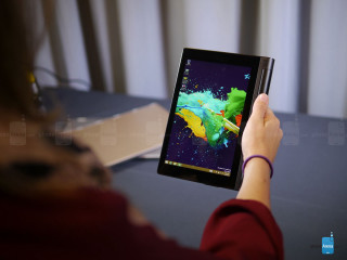 Person tablet cat sitting next - a cat sitting next free wallpaper