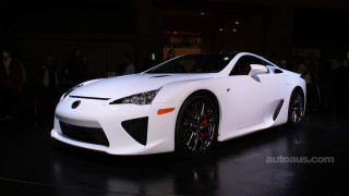 White sports car showroom people - a showroom free wallpaper