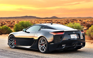 Black sports car desert sunset 2 - the side of the road in the desert free wallpaper